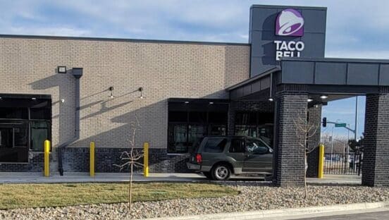 The new location features a dual-lane drive-thru, a vestibule equipped with two ordering kiosks, and a late-night pickup window for mobile orders.