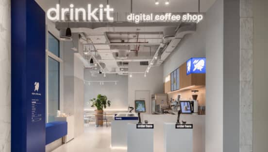 An entrance into a Drinkit store.