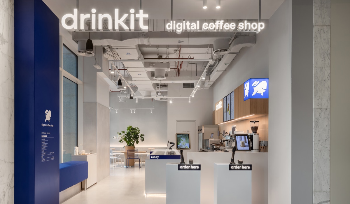 An entrance into a Drinkit store.