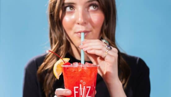 Customer drinking a drink at Fiiz Drinks.