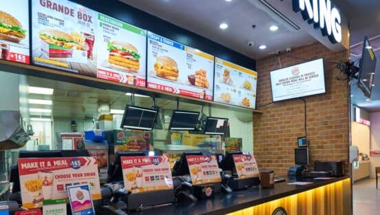 Burger King menuboard inside an airport.