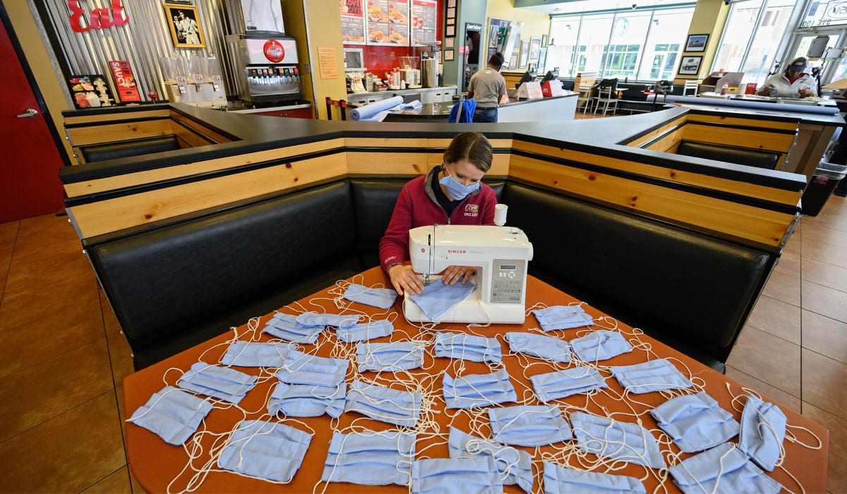 Raising Cane's Employee Makes Masks In Closed Store