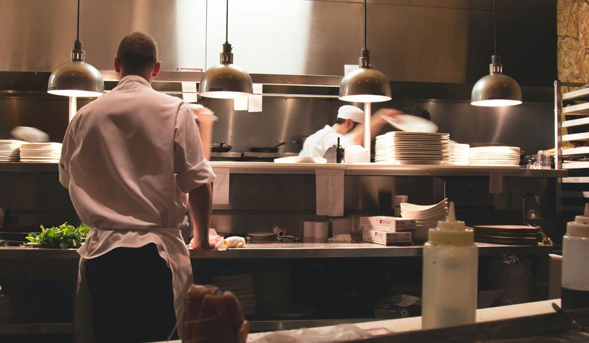 Workers In A Restaurant Kitchen